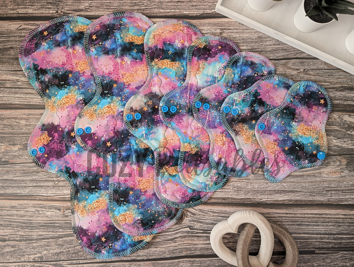 "Cosmic Glitter" Basic shaped Serged Cloth Pad •  Cotton Spandex Topper • Wavy Stitched Core